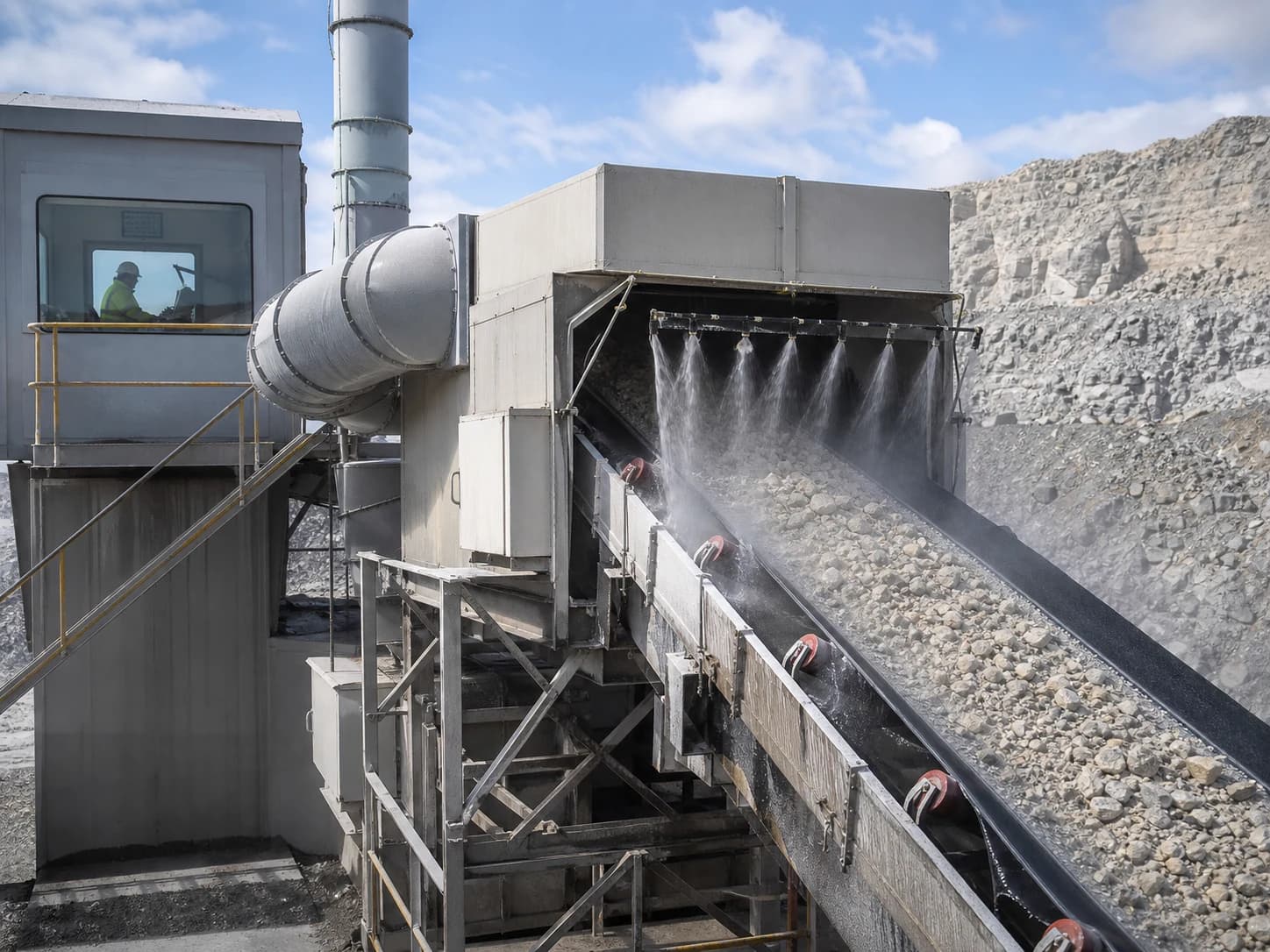 Wet methods, enclosure, local exhaust, filtered cabs, and worker separation control silica at drilling, crushing, screening, and transfer sources.