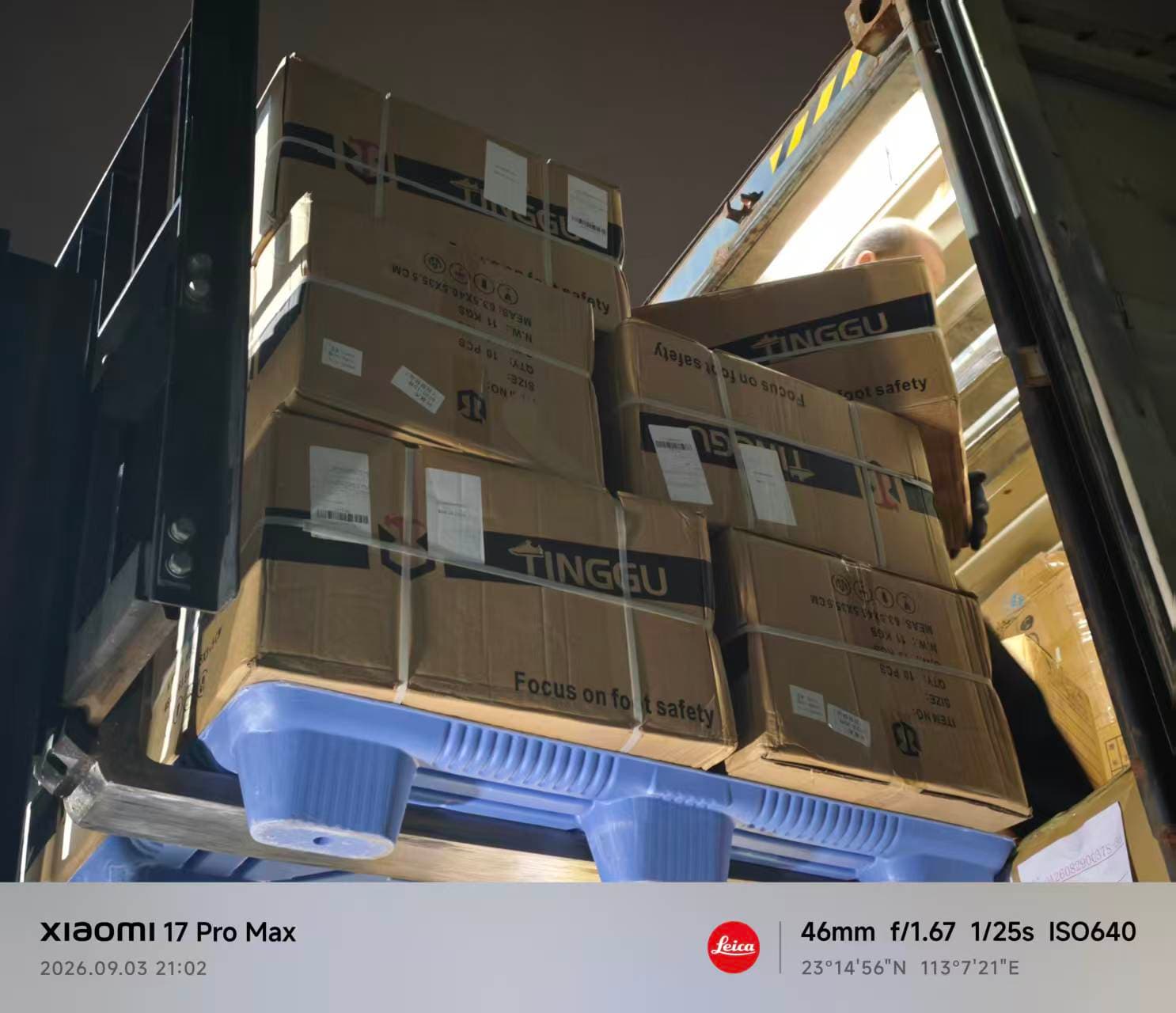 Cartons on a pallet at the opening of a goods vehicle.